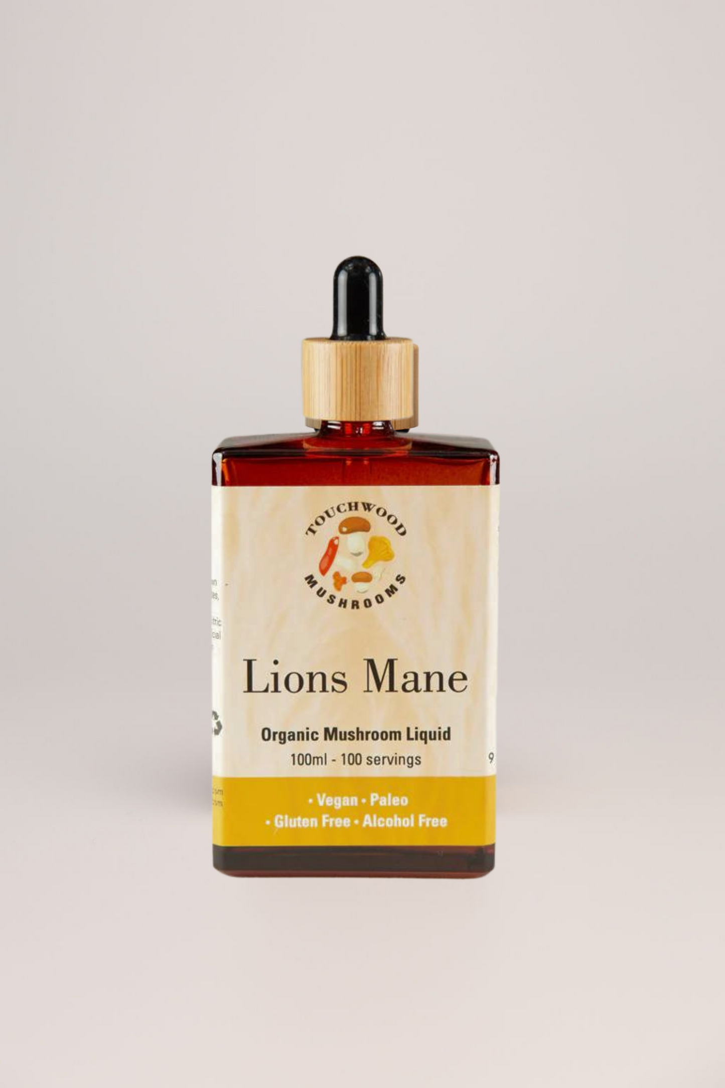 Bottle of Lions Mane Organic Mushroom Liquid with a dropper on a light grey background