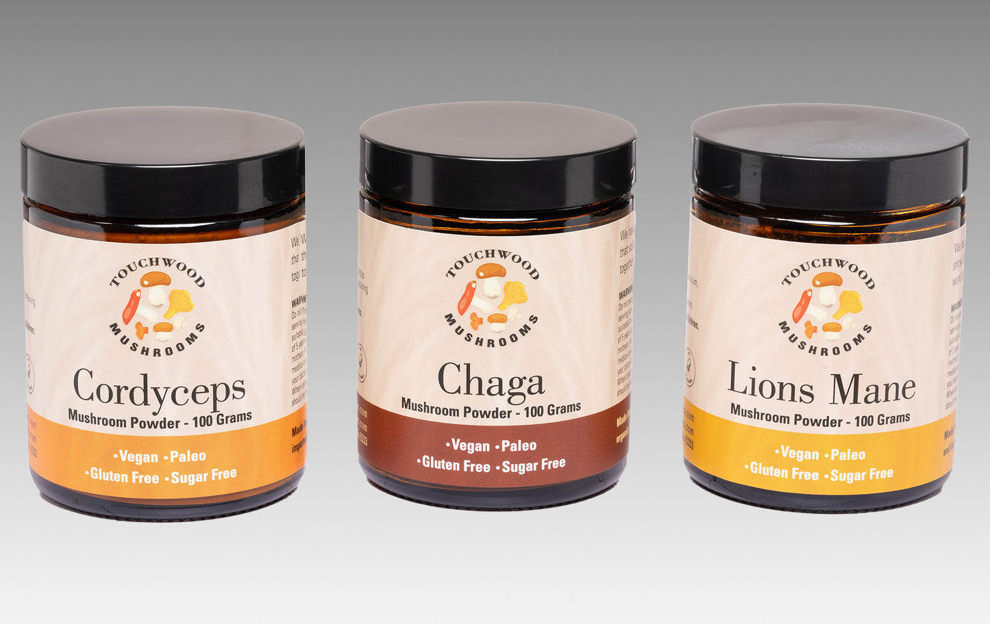 Three jars of mushroom powder health supplements, labeled Chaga, Cordyceps, and Lions Mane, arranged side by side.