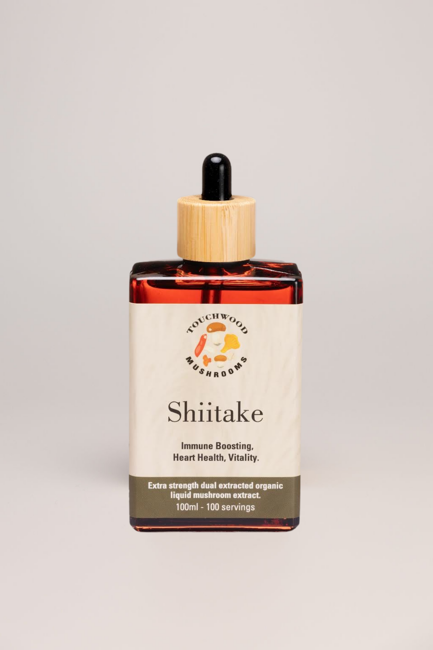 Bottle of Shiitake Mushroom extract on a light grey background